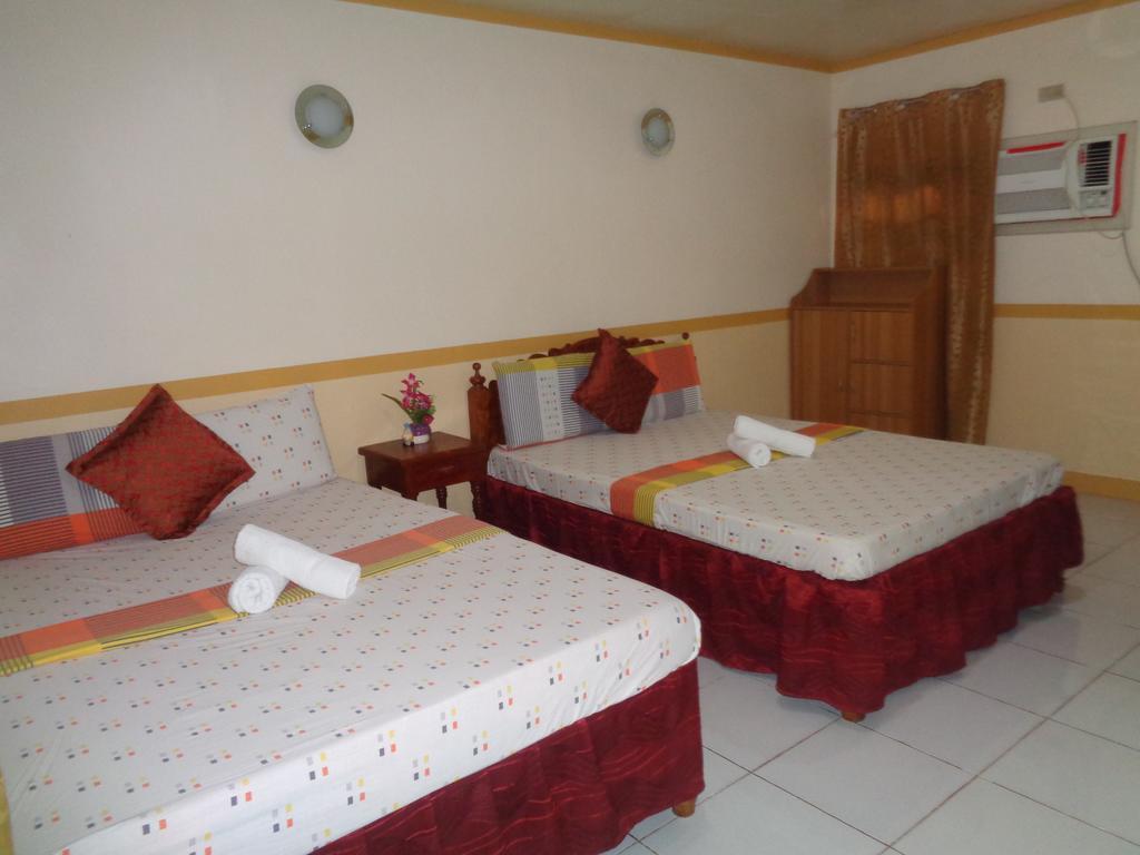 D'Lucky Garden Inn & Suites Tiniguiban Εξωτερικό φωτογραφία