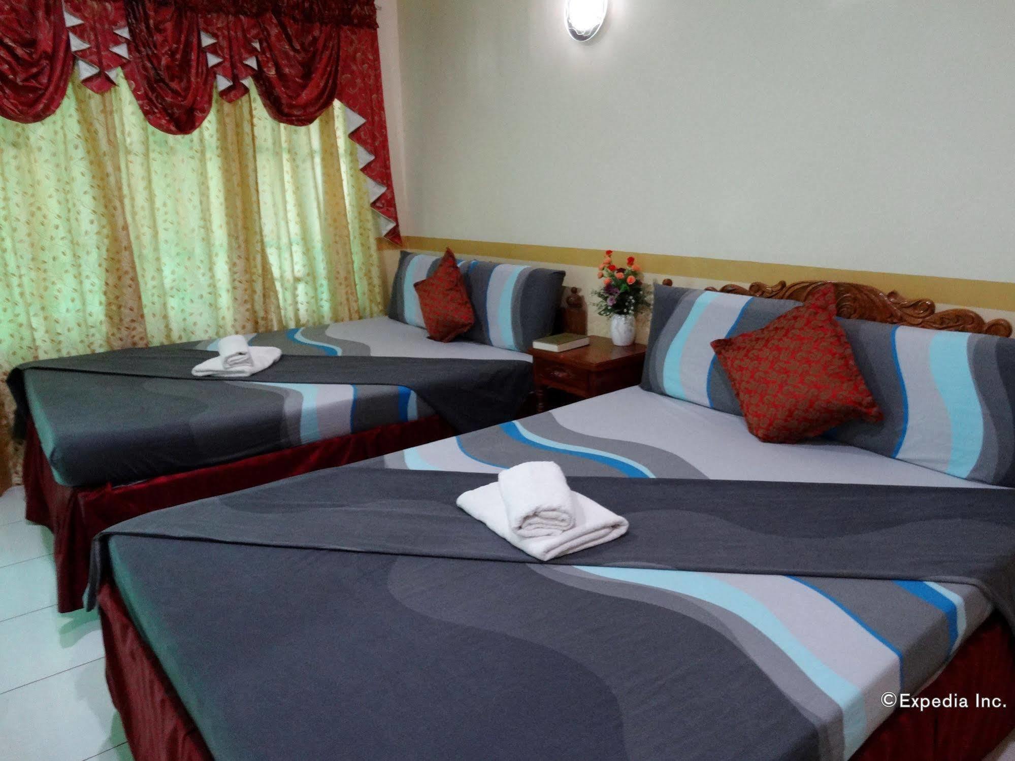 D'Lucky Garden Inn & Suites Tiniguiban Εξωτερικό φωτογραφία