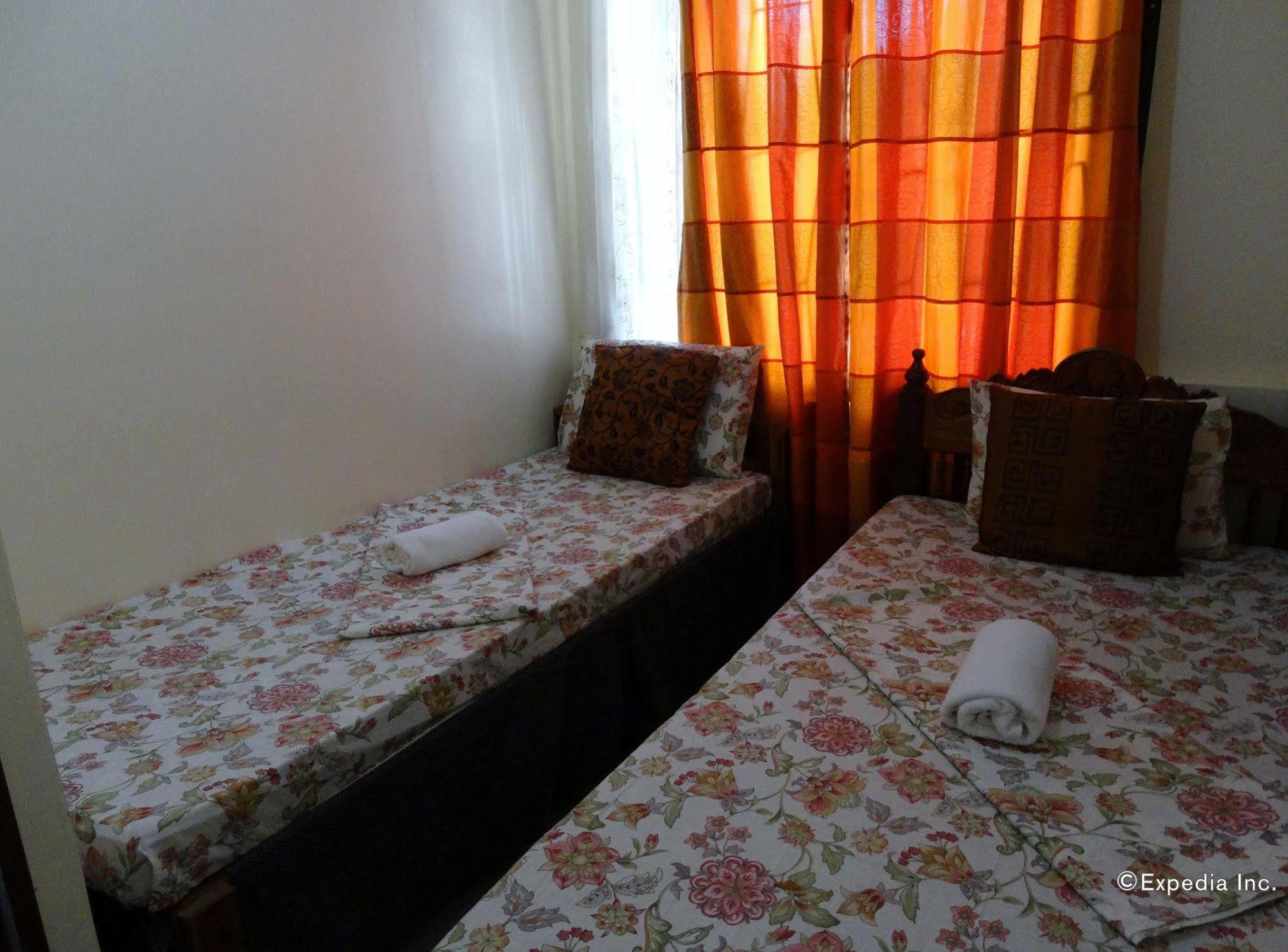 D'Lucky Garden Inn & Suites Tiniguiban Εξωτερικό φωτογραφία