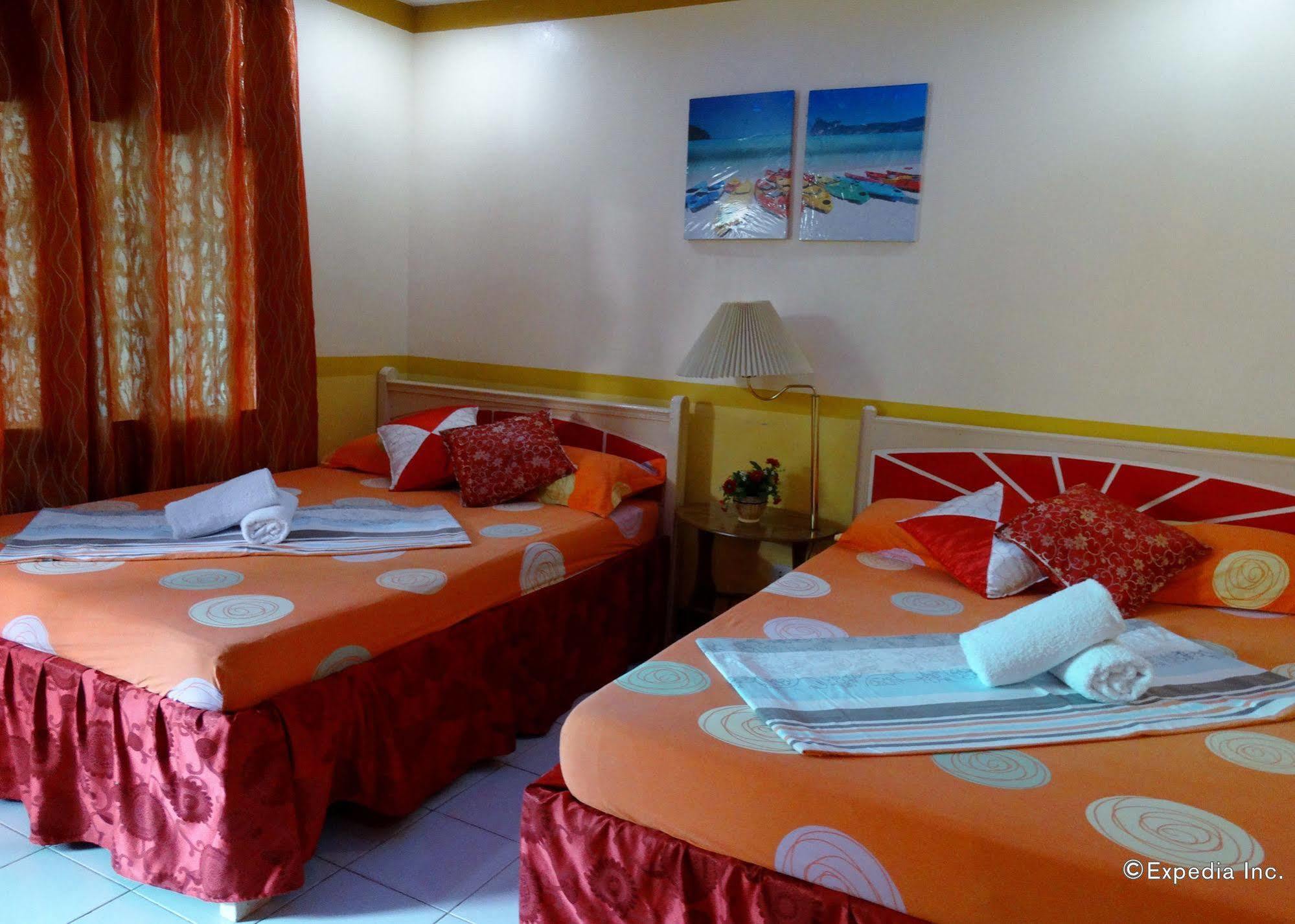 D'Lucky Garden Inn & Suites Tiniguiban Εξωτερικό φωτογραφία