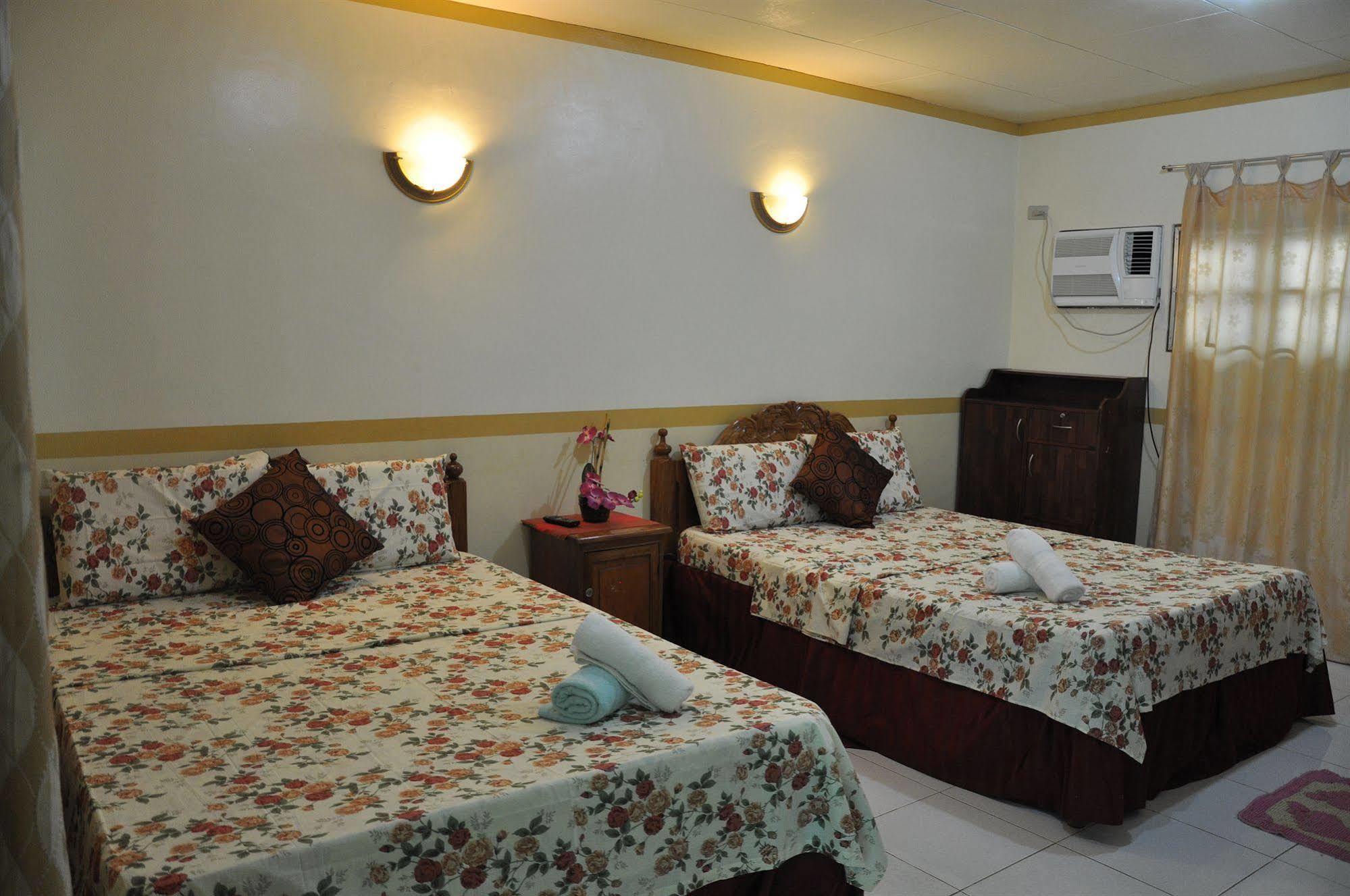 D'Lucky Garden Inn & Suites Tiniguiban Εξωτερικό φωτογραφία